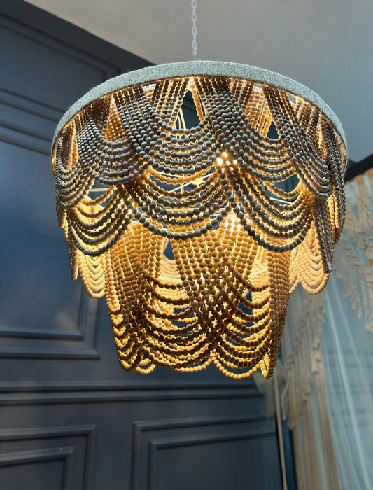 "Large handmade wooden bead chandelier with boho style, perfect for hotel lobbies, wedding venues, or cozy cafés."